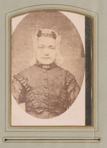 Portrait of a woman with a traditional cap