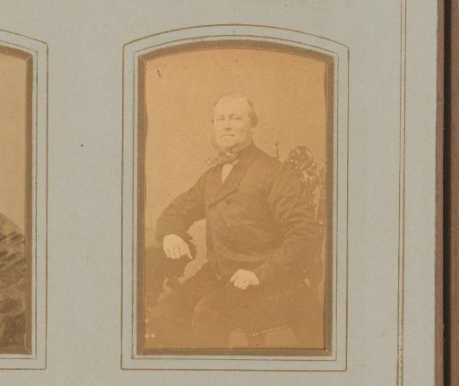 Portrait of a Man Sitting on a Chair