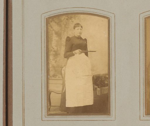 Portrait of a Standing Woman with an Apron and Serving Tray