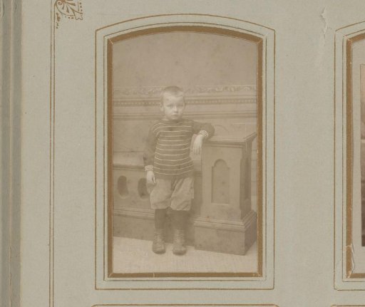 Portrait of a Boy Standing by a Column