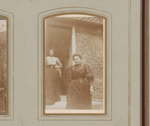 Portrait of a Woman in Front of a House, with Another Woman in a Doorway in the Background
