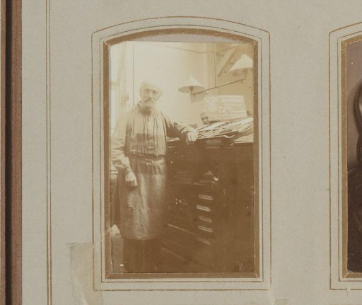 Portrait of a Man by a Cabinet with Letter Trays