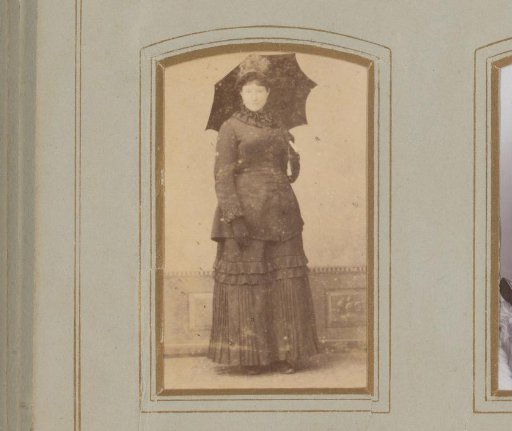 Portrait of a Standing Woman with a Black Parasol