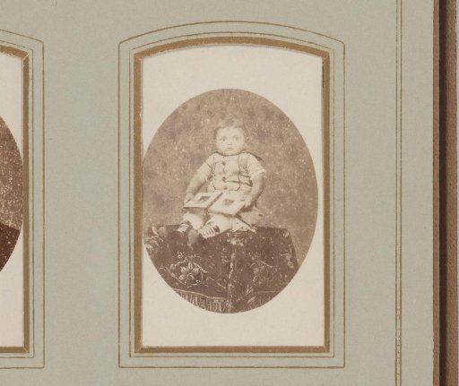 Portrait of a Baby with a Book