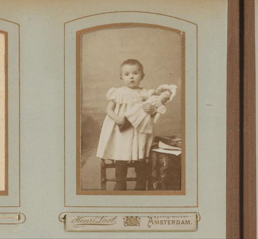 Portrait of a Child with a Doll