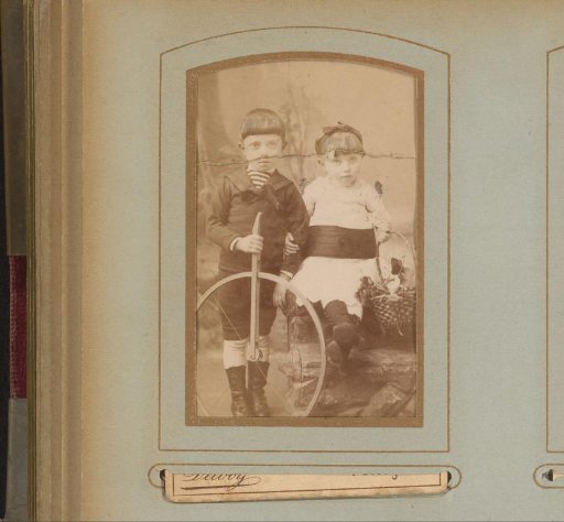 Portrait of a boy and girl with toys