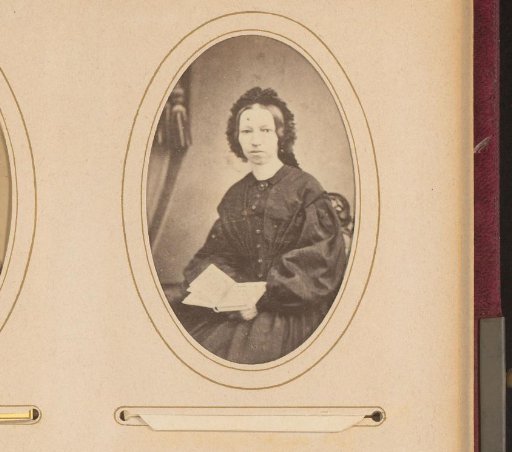 Portrait of a Woman with a Cap and an Open Book
