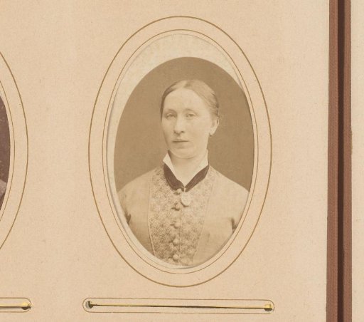 Portrait of a young woman with medallion