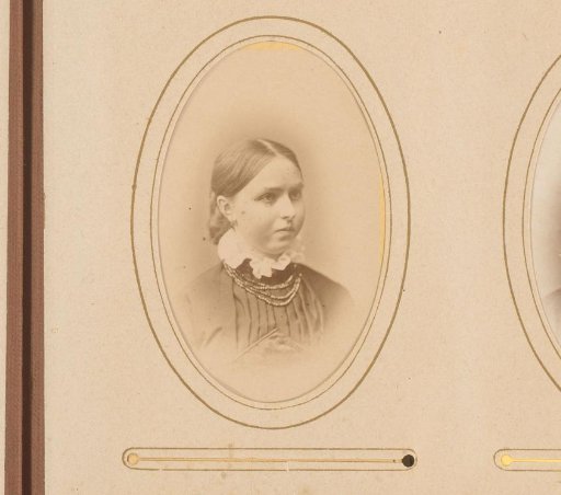 Portrait of a young woman with necklace