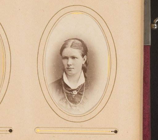 Portrait of a young woman with necklace