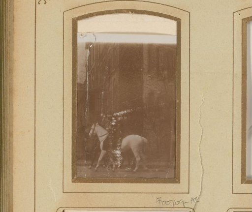 Street view with a man on horseback