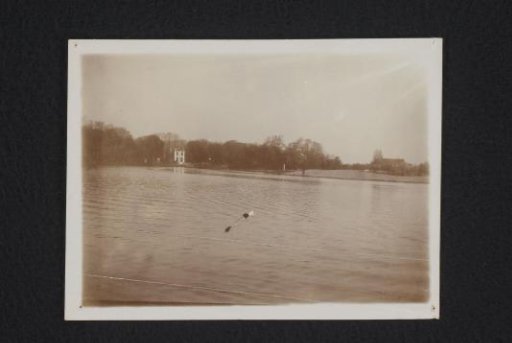 View of a lake with a country house