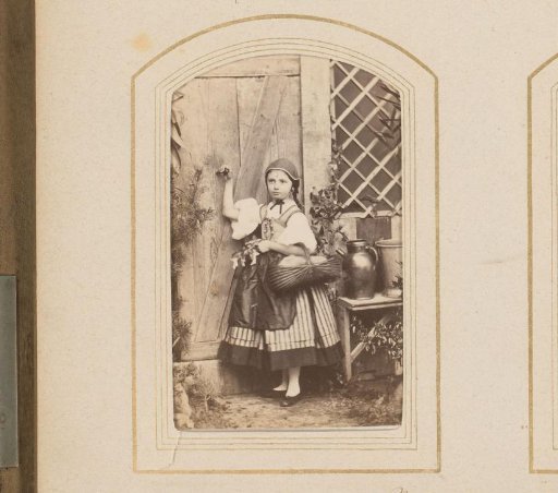 Portrait of a girl dressed as Little Red Riding Hood