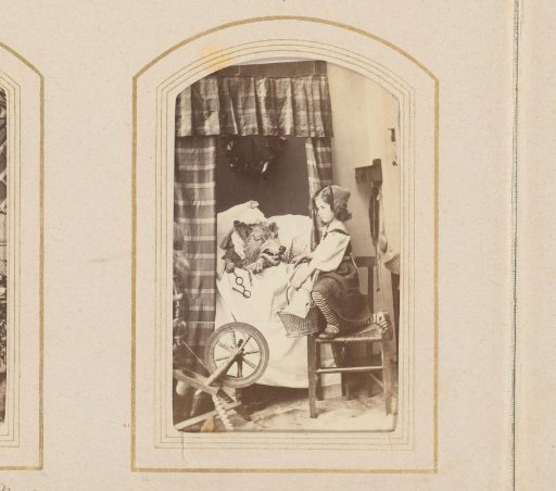Portrait of a girl dressed as Little Red Riding Hood with the wolf