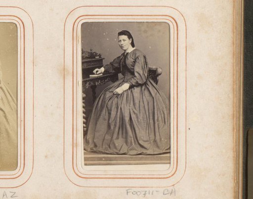 Portrait of a Seated Woman at a Desk