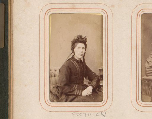 Portrait of a Seated Woman with a Cap