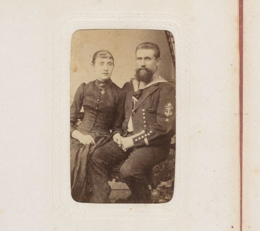 Portrait of a woman and a man in military uniform