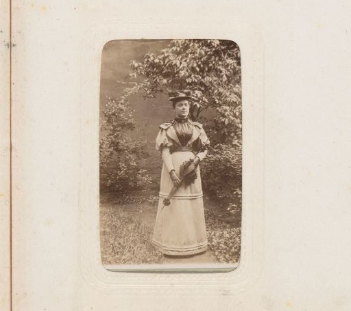 Portrait of a Woman with a Hat and Parasol, Standing in a Garden