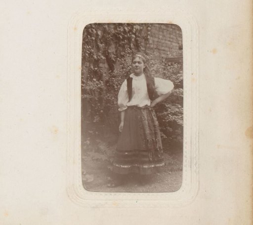Portrait of a Young Woman Standing in a Garden