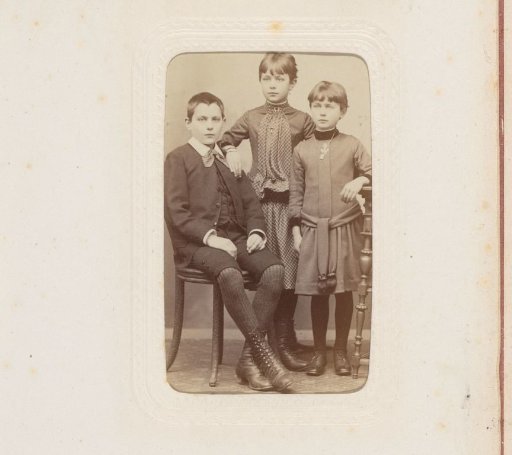 Portrait of Three Children, One of Whom is Sitting on a Chair