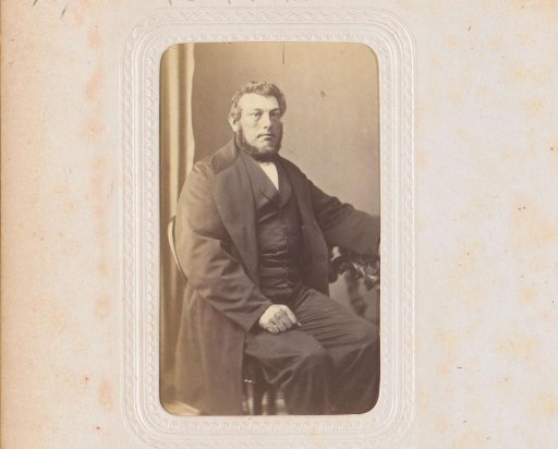 Portrait of a man, seated at a table, inscribed as the contractor W. Nugteren