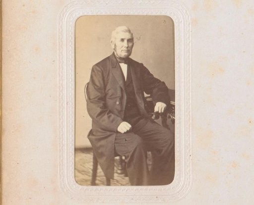 Portrait of a man, seated at a table, inscribed as a contractor