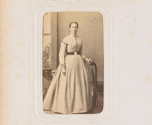 Portrait of a standing woman by a chair, inscribed as Kraayenhoft