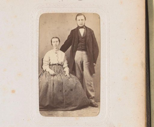 Portrait of a seated woman and a standing man
