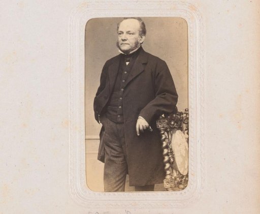 Portrait of a man standing by a chair, inscribed as Ringers