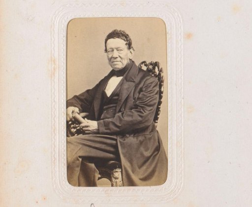 Portrait of a seated man with a book in his hand, designated as G.Fr. Scheefbaan