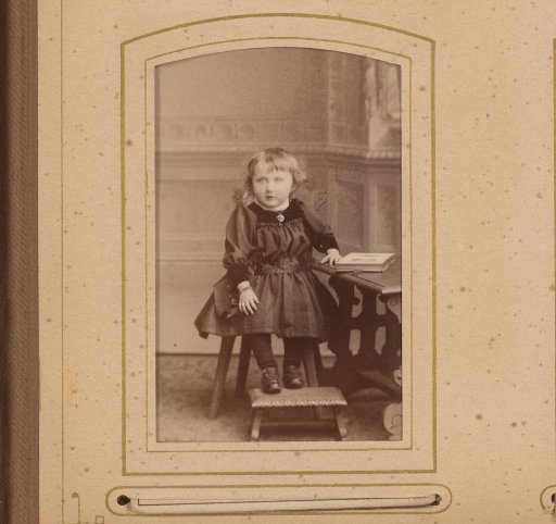 Portrait of a Girl, Seated at a Table with an Open Book