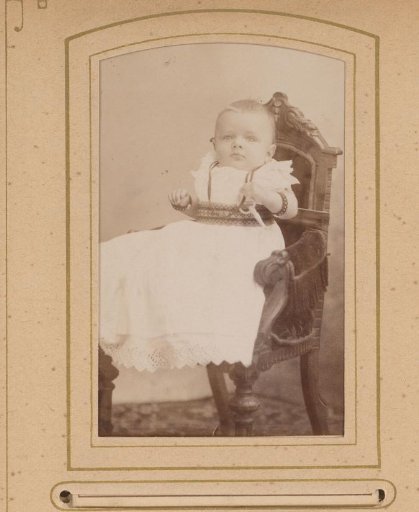 Portrait of a Baby, Sitting in a Chair