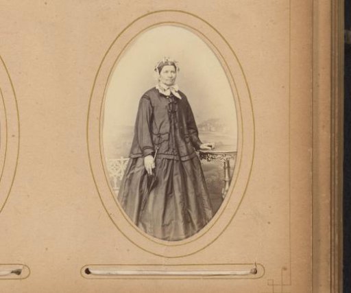 Portrait of a Standing Woman Holding an Umbrella