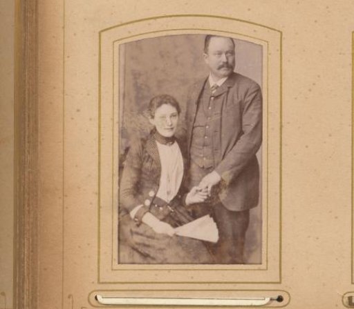 Portrait of a Seated Woman Holding a Fan and a Standing Man