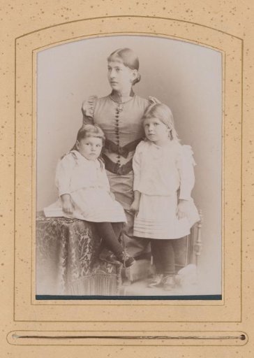 Portrait of a Standing Woman and Two Girls