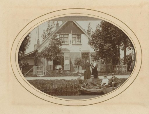 Three men and a woman in a rowing boat and two women on the shore, with a house in the background