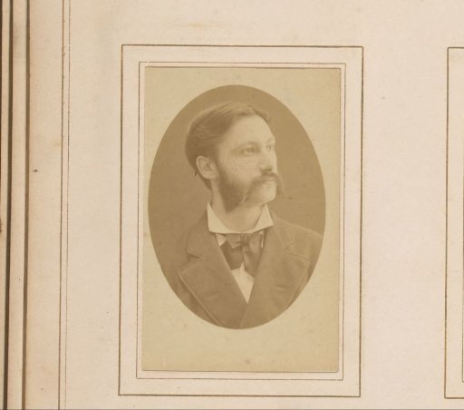 Portrait of a man with sideburns and a mustache