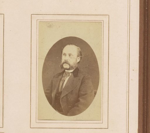 Portrait of a man with sideburns and a mustache