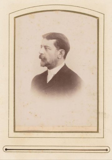 Portrait of a man with a moustache and beard, in profile