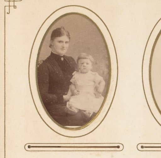 Portrait of a woman with a baby on her lap