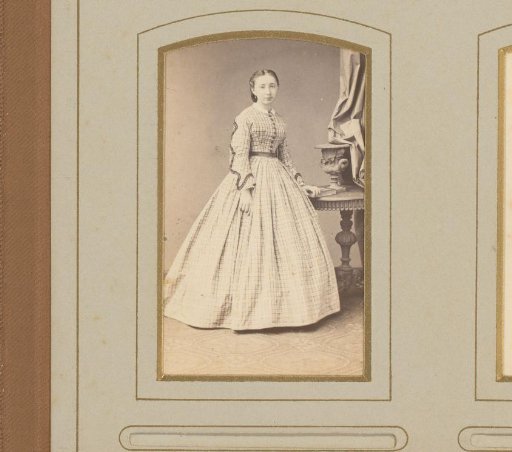 Portrait of a standing young woman
