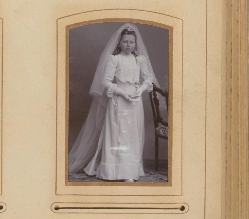 Portrait of a girl in a communion dress