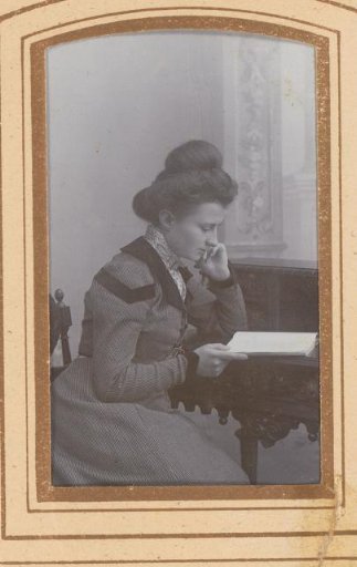 Portrait of a Seated Reading Woman