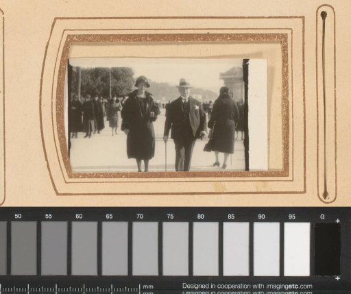 Street scene with a walking married couple