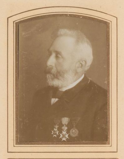 Portrait of a man with a beard and three medals