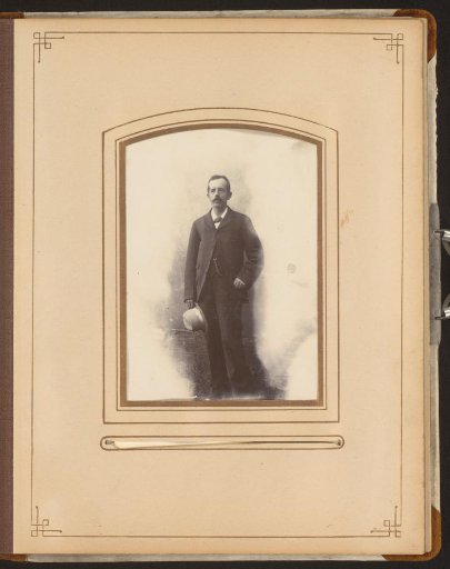 Portrait of a Man with a Mustache and a Hat in His Hand