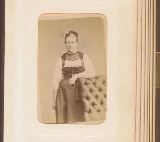 Portrait of a standing woman in possibly Swiss costume