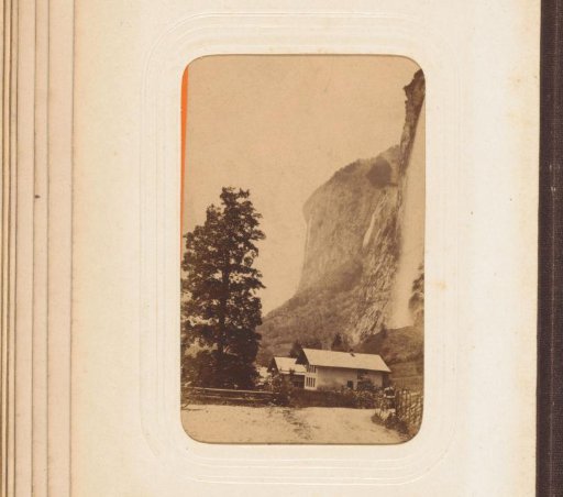 Landscape with houses against a rock wall