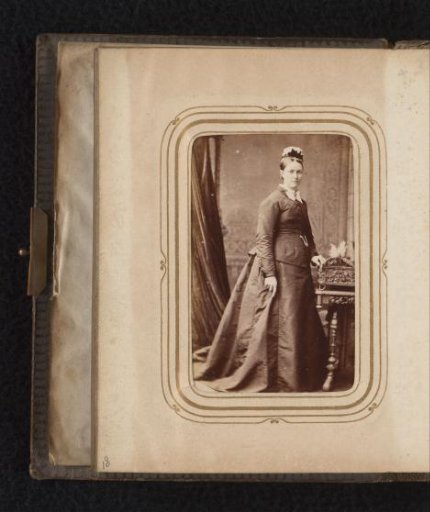 Portrait of a Standing Woman with a Cap