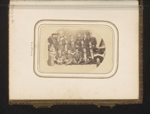 Group portrait of crew members on board a ship